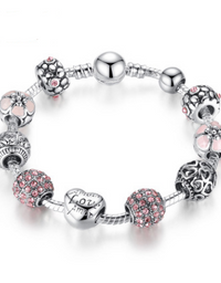 Sophisticated Silver Charm Bracelet: Elegance Meets Versatility in Your Everyday Style
